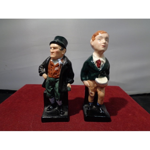 717 - EIGHT ROYAL DOULTON DICKENS FIGURES