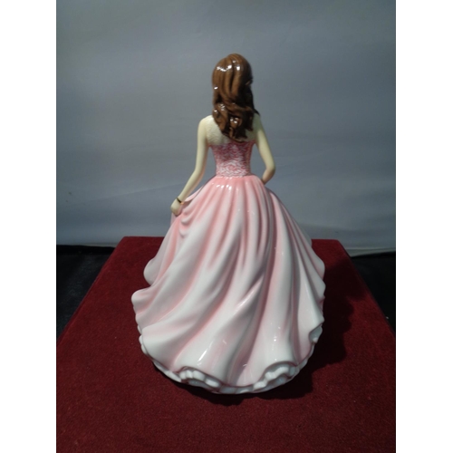 746 - A ROYAL DOULTON FIGURINE BEAUTIFUL CHARM