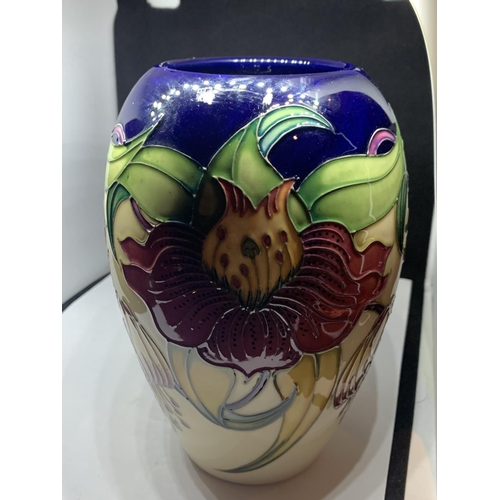 779 - A MOORCROFT ANNA LILY VASE 7 INCHES TALL