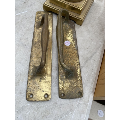 1925 - A GILT TABLE LAMP AND A PAIR OF BRASS PUSH PLATES