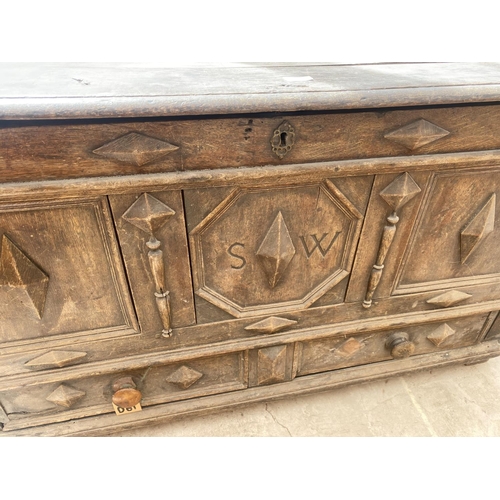 2118 - A GEORGE III OAK BLANKET CHEST WITH THREE PANEL FRONT BEARING INITIALS S.W AND DRAWER TO BASE, 50