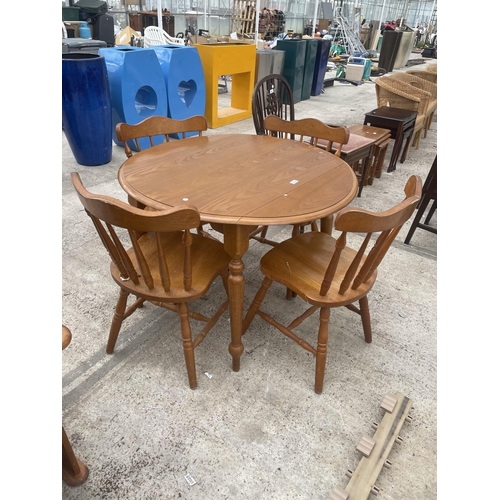 2525 - A MODERN CICULAR DROP-LEAF DINING TABLE W:40