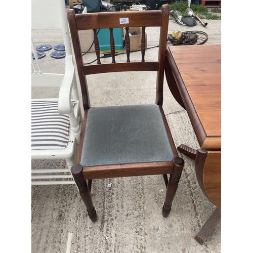 2531 - A PINE DROP-LEAF DINING TABLE AND TWO CHAIRS