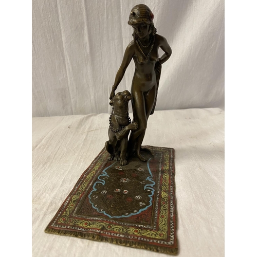 27 - A BERGMAN STYLE COLD PAINTED NAN GREB BRONZE IN THE FORM OF A DANCER AND LIONESS H: APPROXIMATELY 15... 