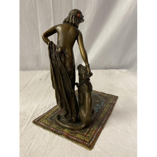 27 - A BERGMAN STYLE COLD PAINTED NAN GREB BRONZE IN THE FORM OF A DANCER AND LIONESS H: APPROXIMATELY 15... 