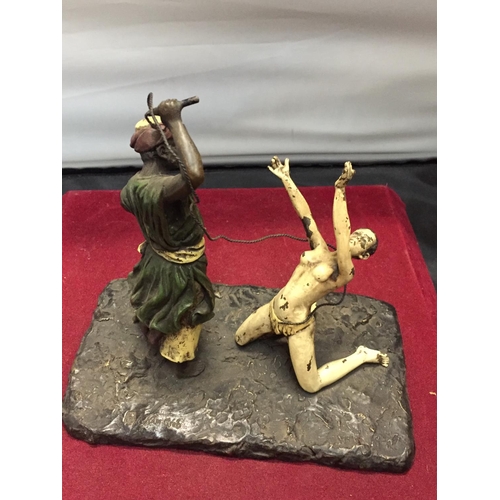 140 - A BERGMAN STYLE COLD PAINTED BRONZE OF A NATIVE AND A WOMAN HEIGHT APPROXIMATELY 15CM