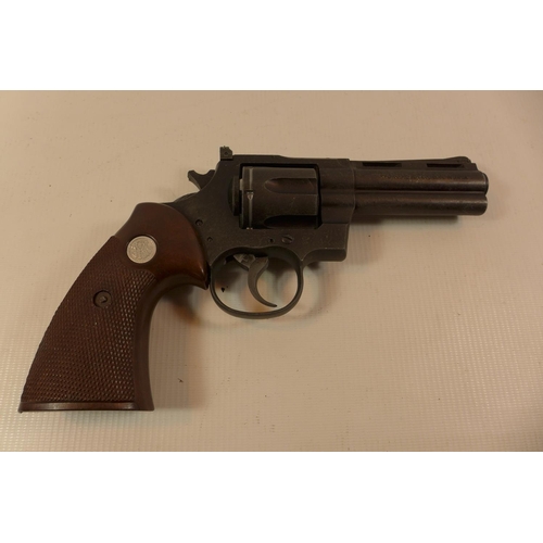 311 - A REPLICA NON FIRING SMITH AND WESSON PYTHON 357 MAGNUM REVOLVER WITH A 10CM BARREL AND HAMMER A/F