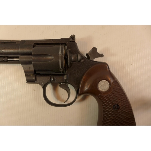 311 - A REPLICA NON FIRING SMITH AND WESSON PYTHON 357 MAGNUM REVOLVER WITH A 10CM BARREL AND HAMMER A/F