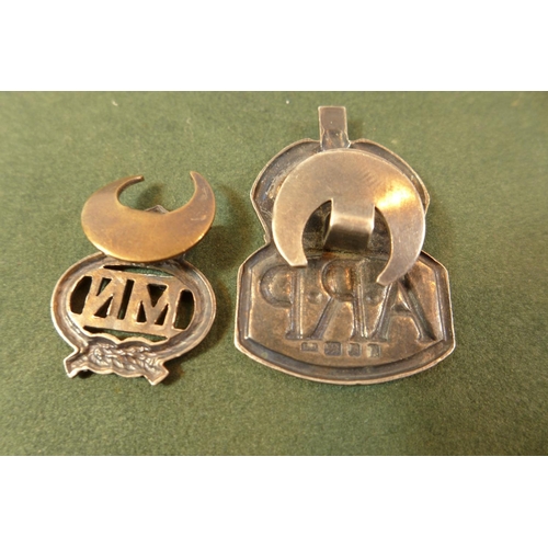 330 - A HALLMARKED SILVER ARP BADGE AND A MERCHANT NAVY ON SERVICE BADGE