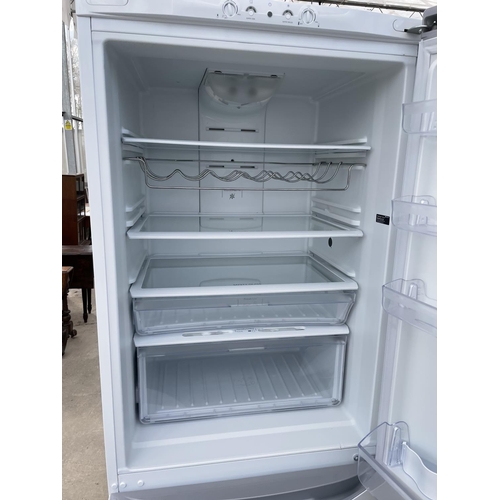 2538 - A WHITE HOTPOINT FRIDGE FREEZER, PAT TEST, FUNCTION TEST AND SANITIZED BUT NO WARRANTY GIVEN