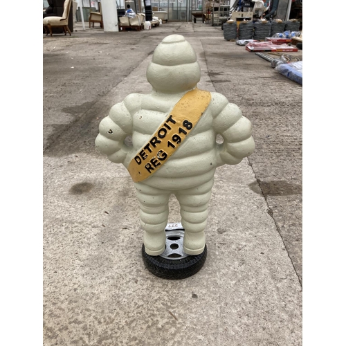 277 - A CAST METAL MICHELIN MAN FIGURE +VAT