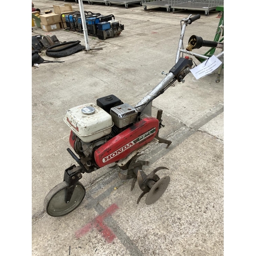 330 - GARDEN ROTOVATOR WITH HONDA ENGINE   IN WORKING ORDER NO VAT