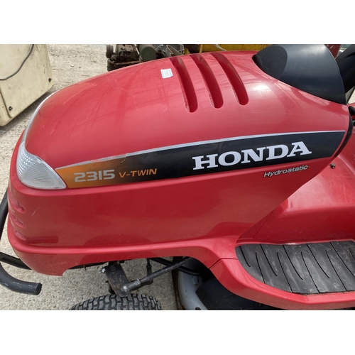 103 - HONDA 2315 V-TWIN RIDE ON MOWER NO VAT GOOD STARTER DECK NEEDS ATTENTION