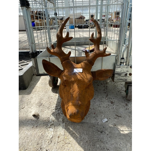 275 - A CAST IRON STAGS HEAD +VAT