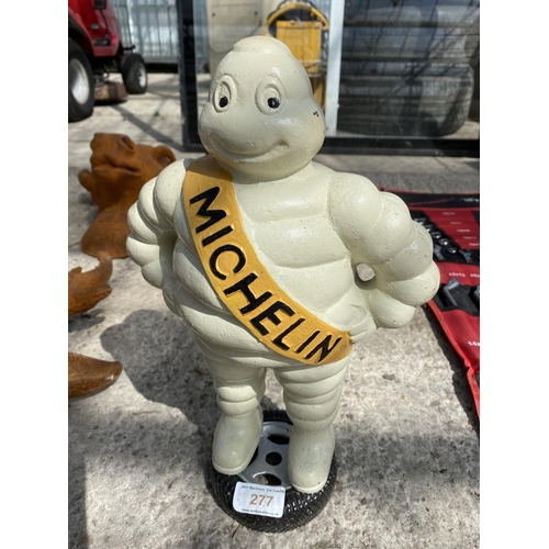 277 - A CAST METAL MICHELIN MAN FIGURE +VAT