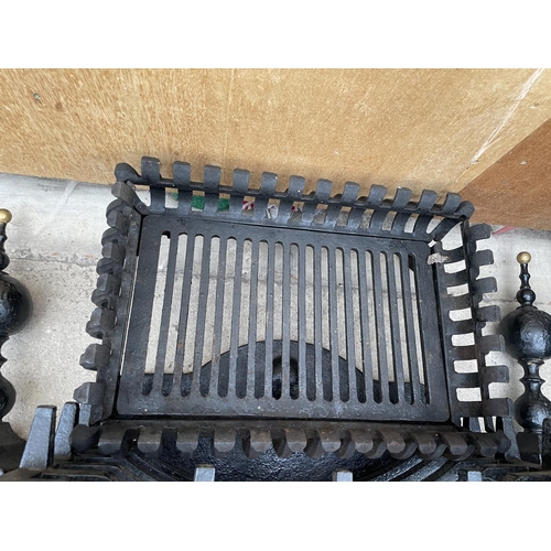 1204 - A CAST IRON FIRE GRATE WITH MATCHING FRONT AND  PAIR OF FIRE DOGS TO ALSO INCLUDE A FURTHER CAST IRO... 