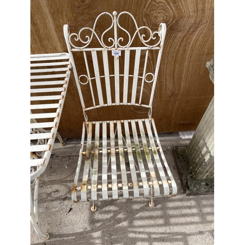 1206 - A METAL BISTRO SET WITH RECTANGULAR TABLE AND FOUR CHAIRS