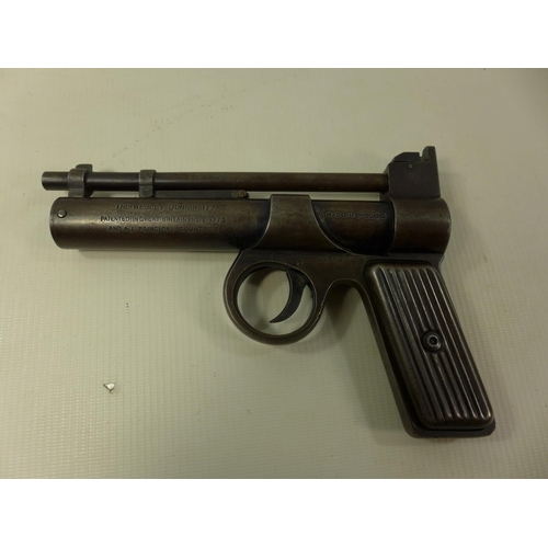 524 - A BOXED WEBLEY JUNIOR .177 CALIBRE AIR PISTOL, 16.5CM BARREL, SERIAL NUMBER J15820 AND 038