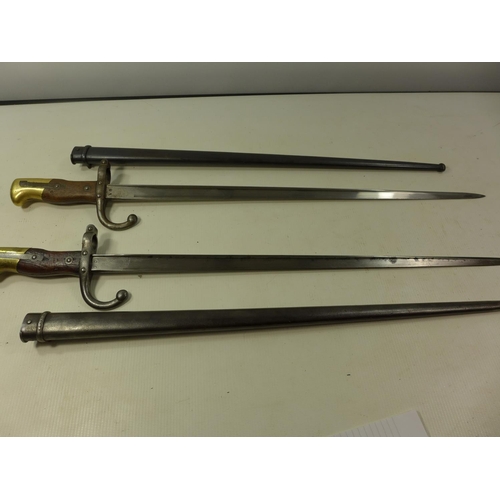 531 - TWO FRENCH GRAS BAYONETS DATED 1877 AND 1879, LENGTH OF BLADES 52CM