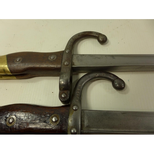 531 - TWO FRENCH GRAS BAYONETS DATED 1877 AND 1879, LENGTH OF BLADES 52CM