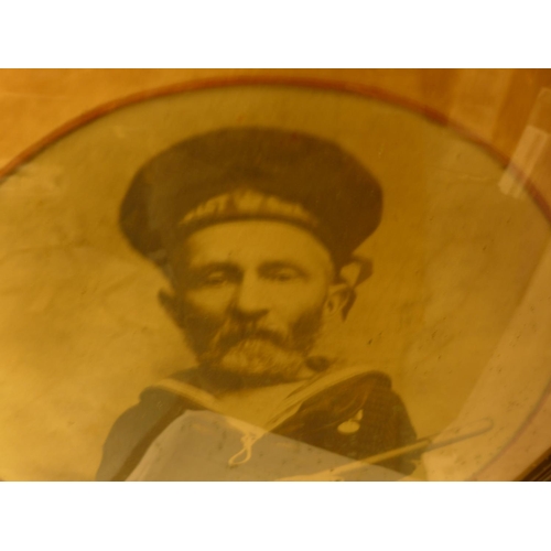 541 - AN EARLY 20TH CENTURY FRAMED BLACK AND WHITE PHOTOGRAPH OF A SAILOR