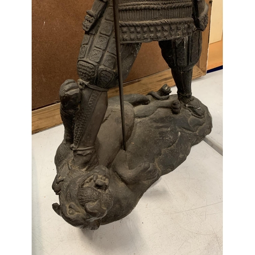 24 - A VERY HEAVY BRONZE FIGURE OF A SAMURAI WARRIOR