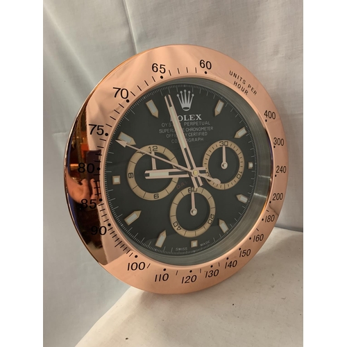 29 - A LARGE ROSE PINK DEALERS WALL CLOCK