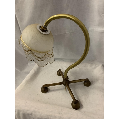 44 - A BENSON BRASS TABLE LAMP WITH DECO GLASS SHADE AND FRINGE