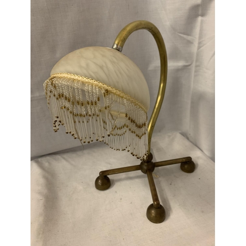 44 - A BENSON BRASS TABLE LAMP WITH DECO GLASS SHADE AND FRINGE