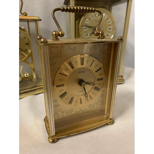 53 - THREE BRASS CARRIAGE CLOCKS
OF HEIGHTS 21CM, 16CM, 13CM.