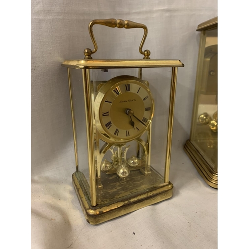 53 - THREE BRASS CARRIAGE CLOCKS
OF HEIGHTS 21CM, 16CM, 13CM.