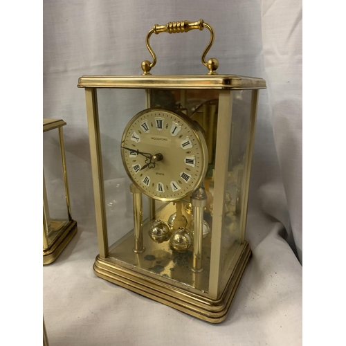 53 - THREE BRASS CARRIAGE CLOCKS
OF HEIGHTS 21CM, 16CM, 13CM.