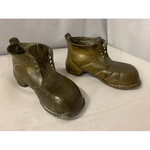 6 - TWO HEAVY BRASS BOOTS L:19CM