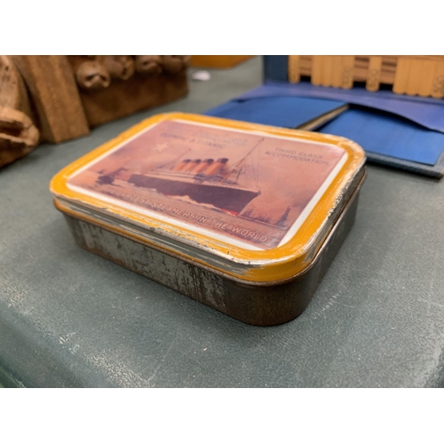 63 - A VINTAGE TOBACCO TIN WITH TITANIC DECORATION