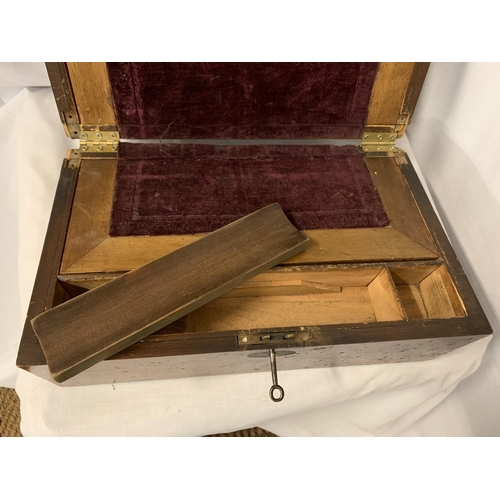 9 - A MAHOGANY WRITING SLOPE WITH A DECORATIVE PLAQUE AND KEY TO INCLUDE A PARKER BIRO