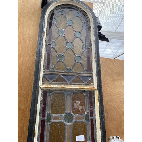 1202A - A PAIR OF TALL CAST IRON WINDOW FRAMES WITH LEADED STAINED GLASS WINDOWS (H:253CM) (SLIGHT DAMAGE TO... 