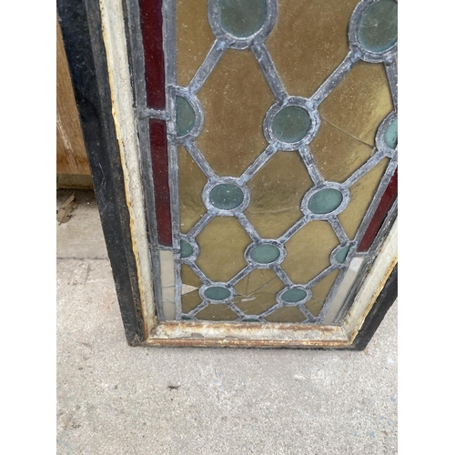 1202A - A PAIR OF TALL CAST IRON WINDOW FRAMES WITH LEADED STAINED GLASS WINDOWS (H:253CM) (SLIGHT DAMAGE TO... 