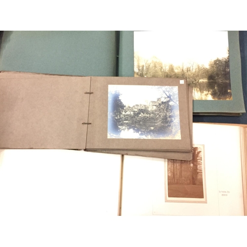 105 - THREE PHOTOGRAPH ALBUMS CONTAINING PHOTOS OF SCENERY AND LANDSCAPES TWO ALBUMS OF WHICH ARE DATED BA... 