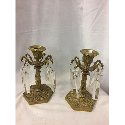 111 - TWO HEAVY CANDLE HOLDERS WITH HANGING GLASS DROPLETS (ONE DROP NOT MATCHING AND ONE A/F)