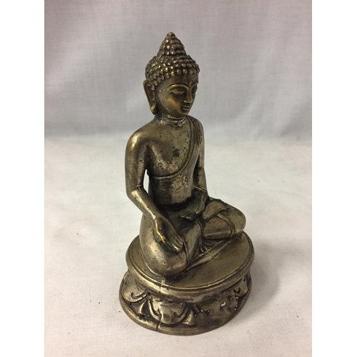 79 - A SILVER PLATED ASIAN SITTING BUDDAH