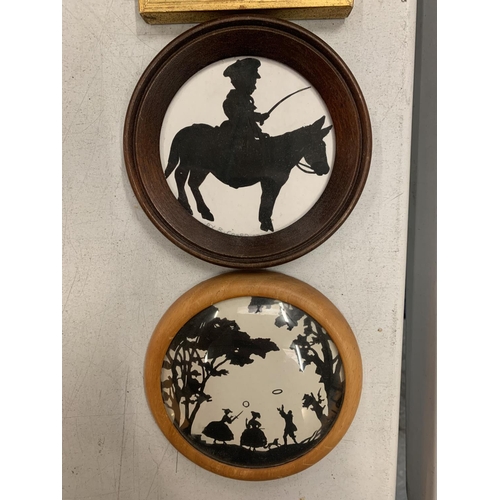 134 - TWO VINTAGE ROUND FRAMED SILHOUETTES AND A SMALL DUTCH ENAMEL GARDEN OF EDEN FRAMED PIECE