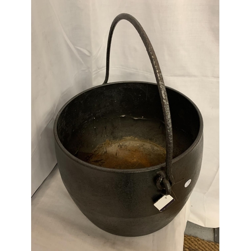 172 - A LARGE CAST IRON CAULDRON