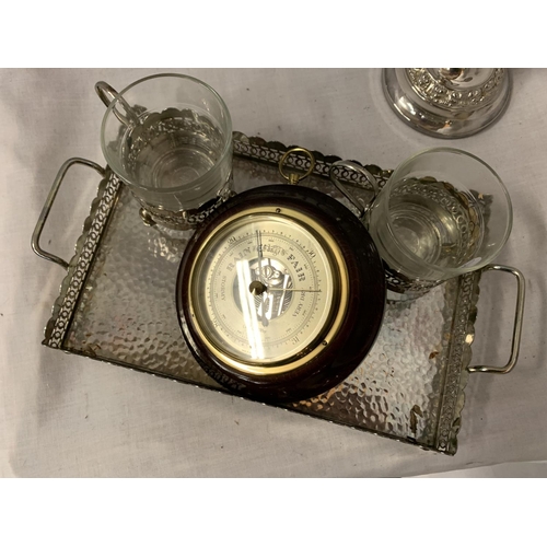 188 - A DECORATIVE TRAY, MATCHING MUGS, CANDLE STICK HOLDER AND A BAROMETER