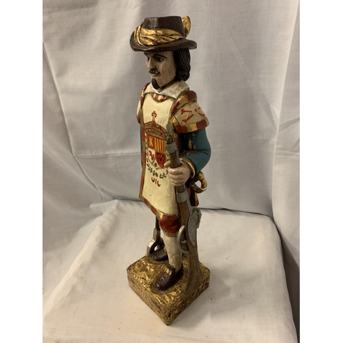 197 - A WOODEN STATUE OF MUSKETEER STYLE CHARACTER H:50CM