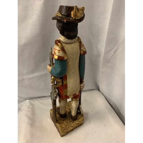 197 - A WOODEN STATUE OF MUSKETEER STYLE CHARACTER H:50CM