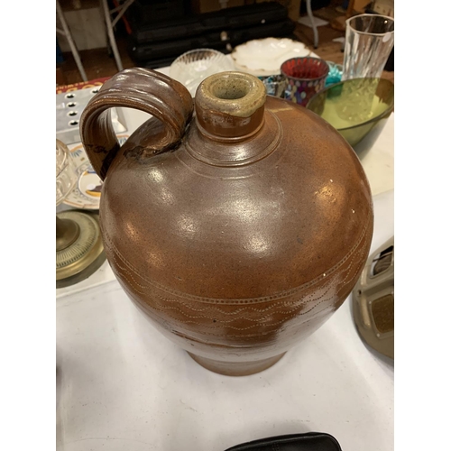 200 - A LARGE TREACLE GLAZE EWER