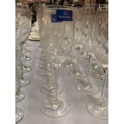 203 - A COLLECTION OF GLASSWARE TO INCLUDE WINE GLASSES, CHAMPAGNE FLUTES ETC