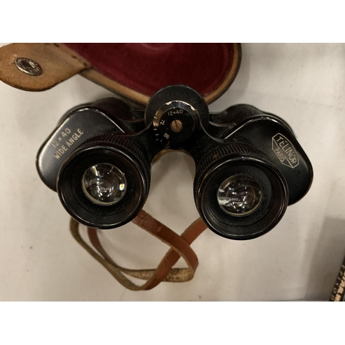 208 - A PAIR OF TELINOR PARIS WIDE ANGLE BINOCULARS IN A LEATHER CARRY CASE