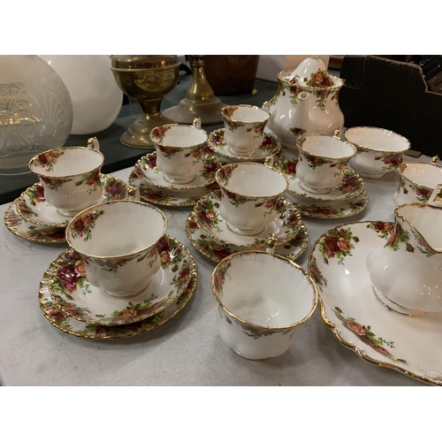 223 - A ROYAL ALBERT 'OLD COUNTRY ROSES' TEA SET COMPRISING TEA POT, MILK JUG, SUGAR BOWL, SIX TRIOS, CAKE... 