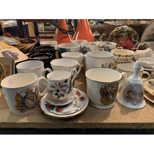 254 - A LARGE ASSORTMENT OF CERAMICS TO INCLUDE MUGS, DECORATIVE PLATES ETC